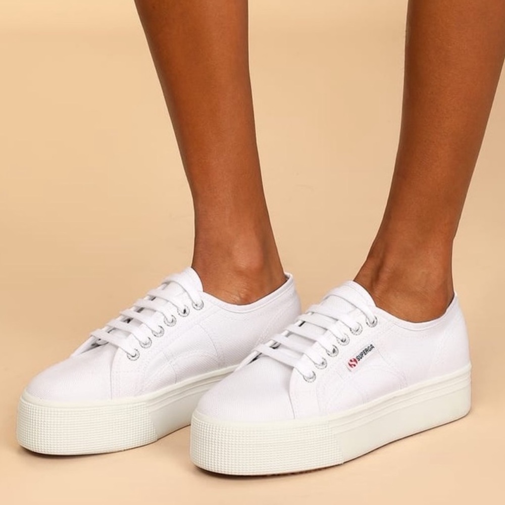 Women’s white Superga platform shoes